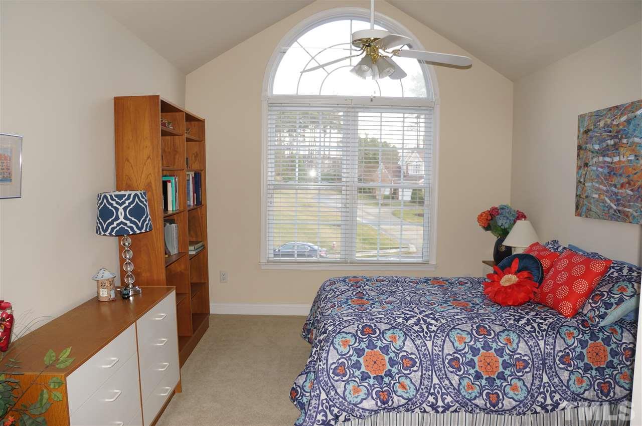 10913 Clovermill Circle Raleigh, NC 27617 - Photo 16 of 25 Cathedral ceiling in this room too, and it is attached to a great bathroom.