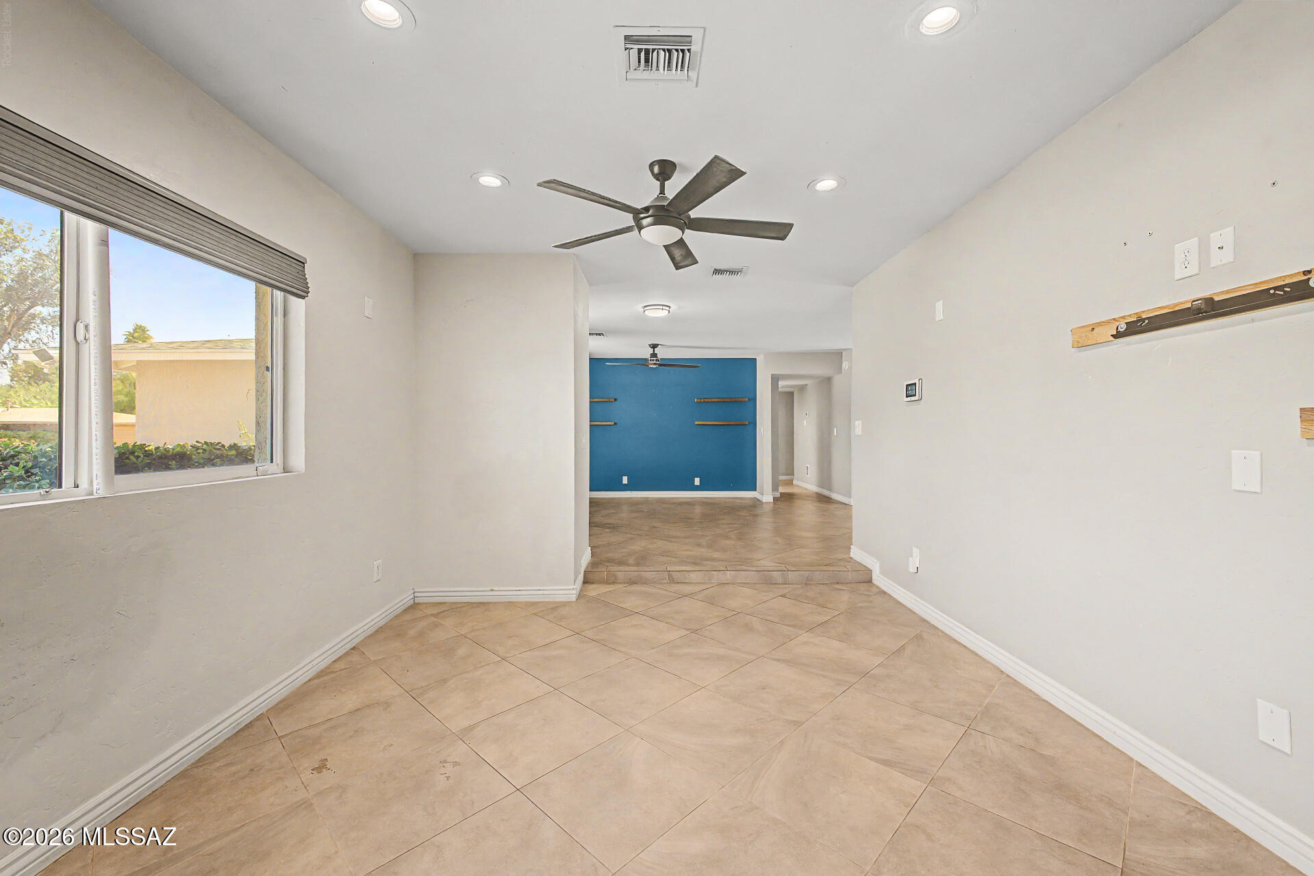 7550 East Rio Verde Drive Tucson, AZ 85715 - Photo 7 of 25 Multiple living spaces provide flexibility for entertaining, relaxing, or spending time with loved ones.