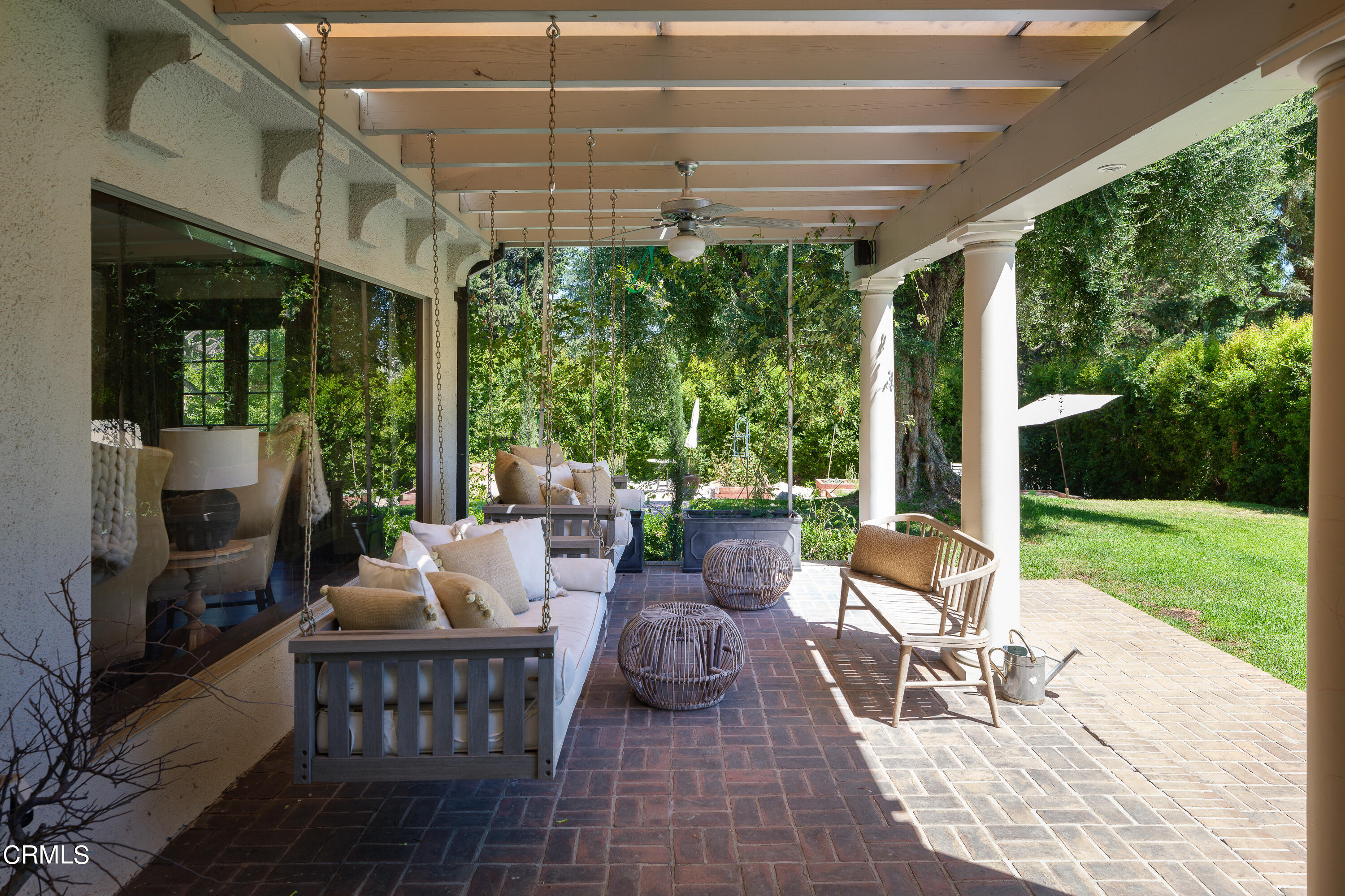 2709 Visscher Place Altadena, CA 91001 - Photo 18 of 75 a view of a patio with couches potted plants and a big yard