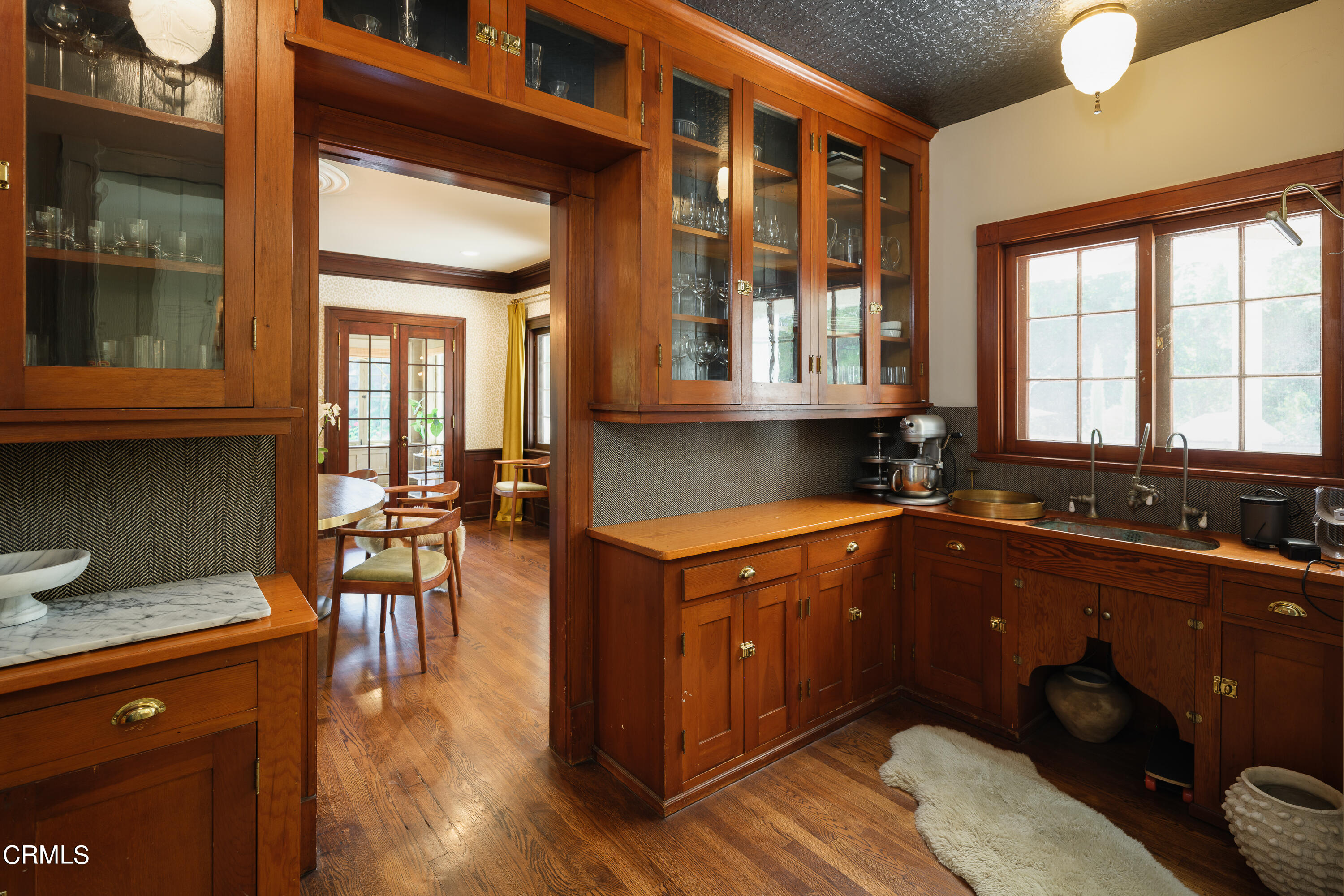 2709 Visscher Place Altadena, CA 91001 - Photo 28 of 75 a kitchen with a sink and wooden cabinets
