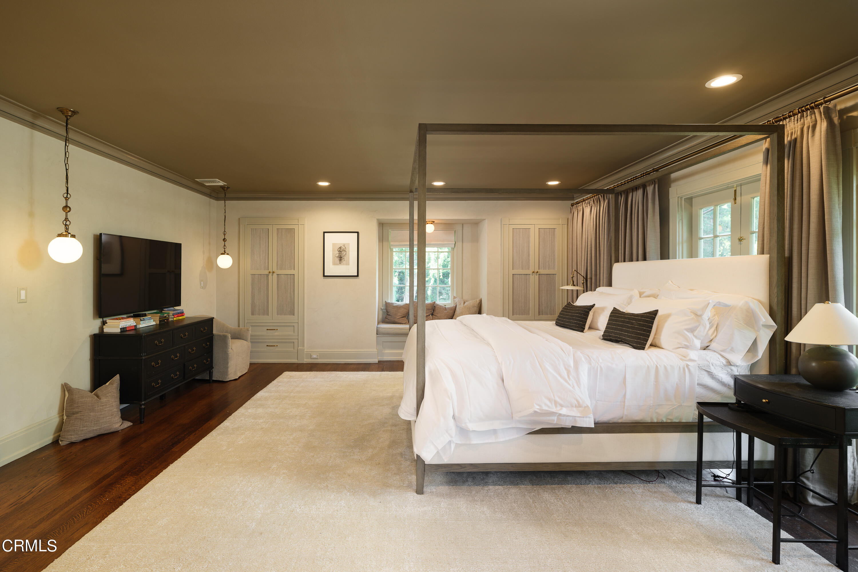 2709 Visscher Place Altadena, CA 91001 - Photo 43 of 75 a spacious bedroom with a bed and a flat screen tv