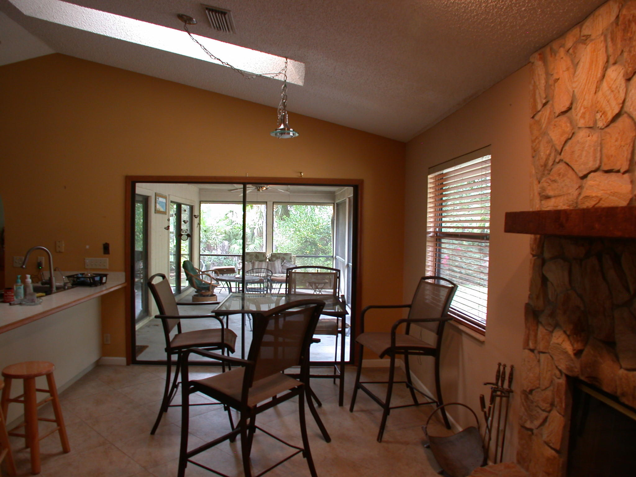 10111 Sandy Run Road Jupiter, FL 33478 - Photo 8 of 14 a view of a dining room with furniture window and outside view