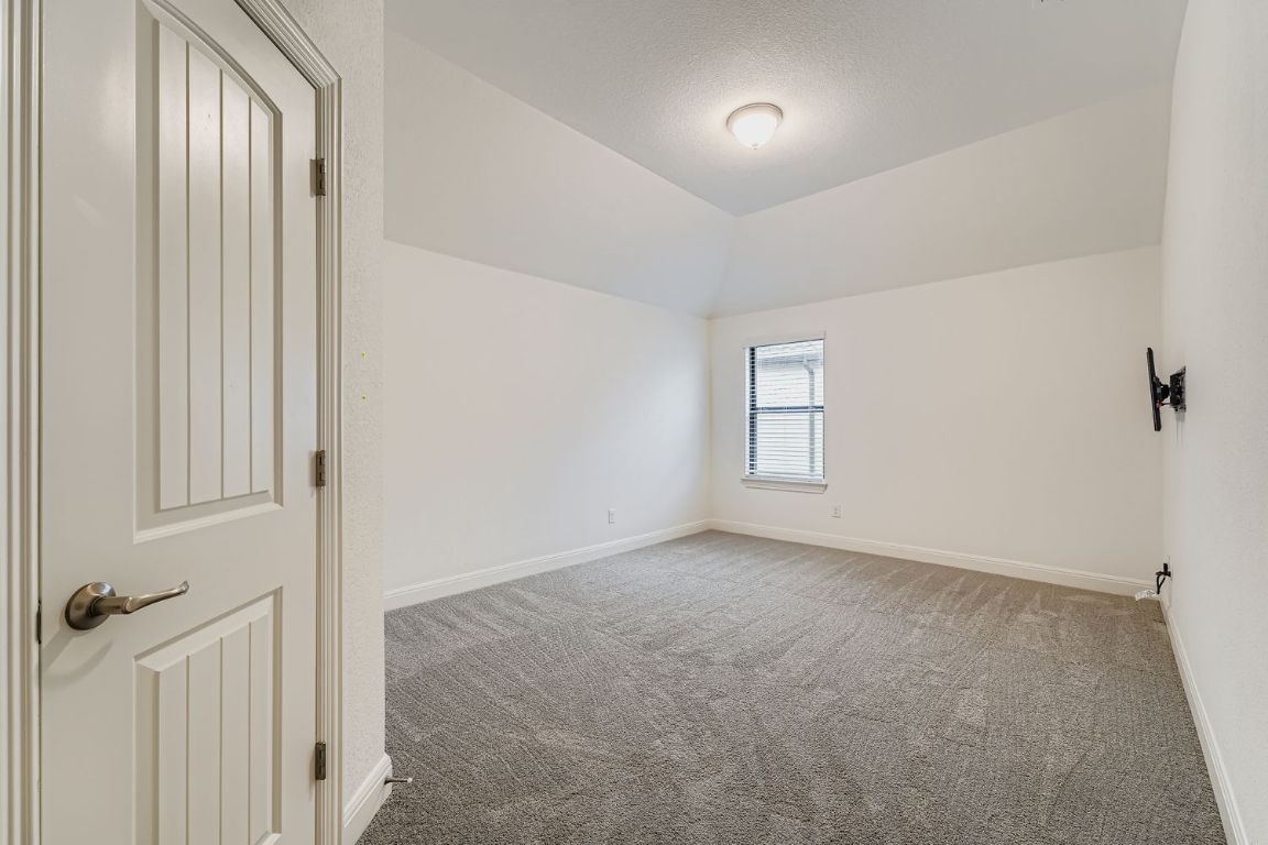 2928 Birdcall Path Leander, TX 78641 - Photo 21 of 36 an empty room with windows