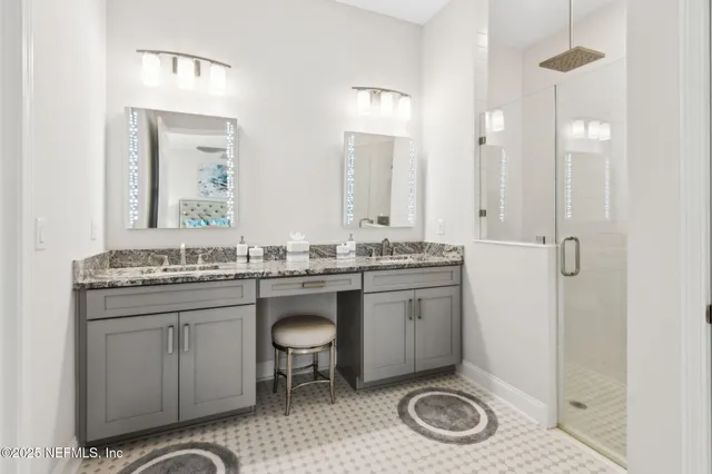 a view of an empty room with stairs wooden floor and cabinet