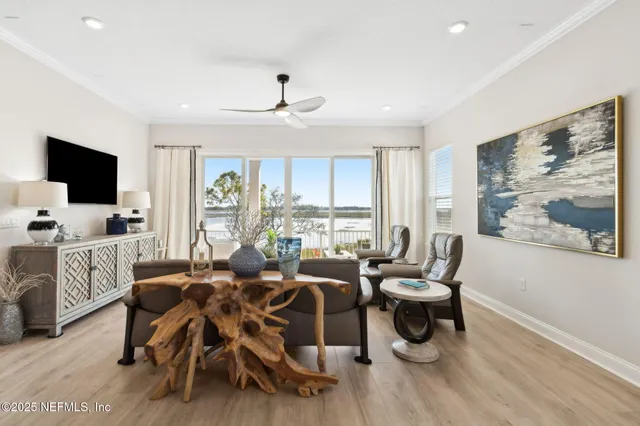 a living room with furniture or couch and a flat screen tv