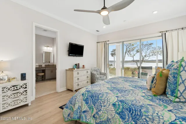 a bathroom with a granite countertop sink a toilet and a mirror