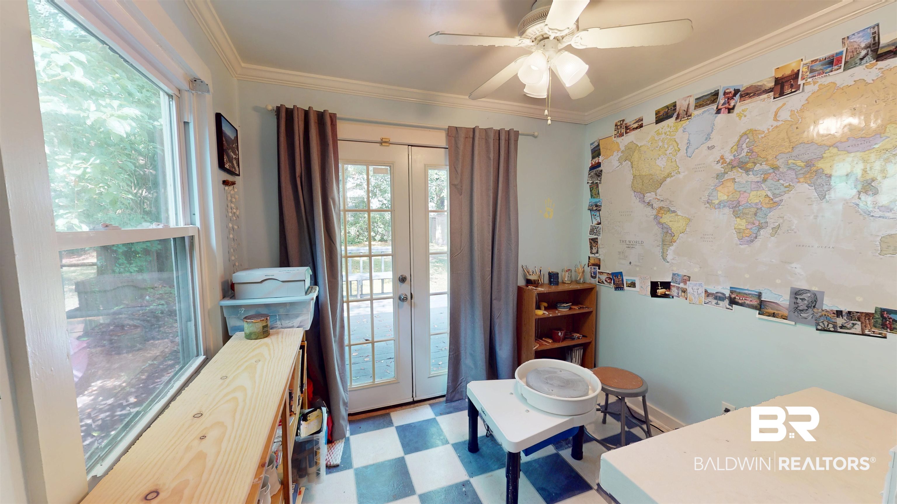 266 Westwood Street Mobile, AL 36606 - Photo 21 of 34 Home office with light flooring, ornamental molding, ceiling fan, and french doors