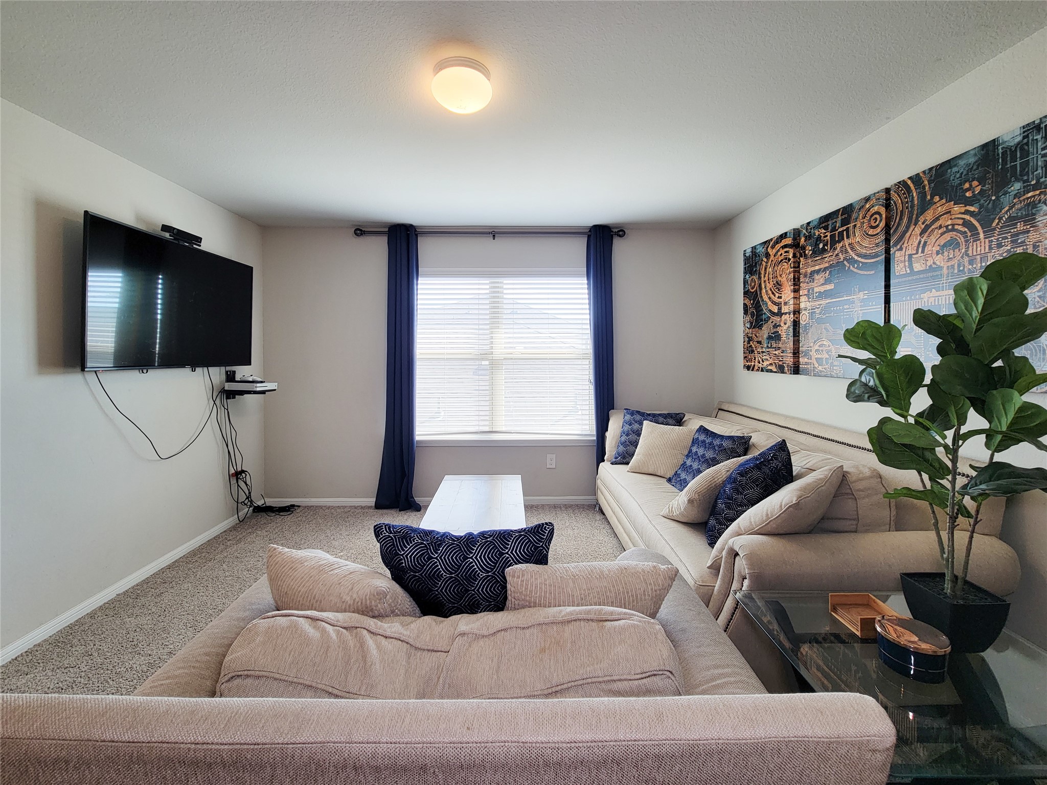 8003 Ecru Lane Rosharon, TX 77583 - Photo 24 of 43 a living room with furniture and a flat screen tv
