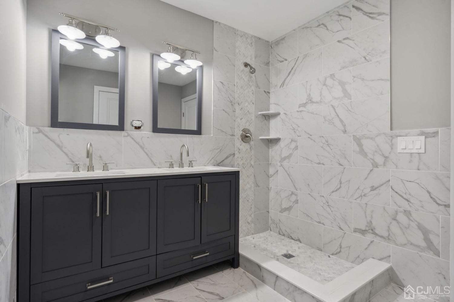 10 Sine Road Edison, NJ 08817 - Photo 7 of 38 a bathroom with a double vanity sink mirror and shower
