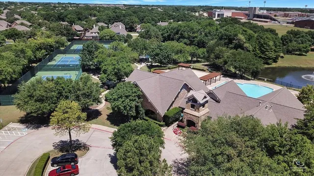 an aerial view of residential house with outdoor space