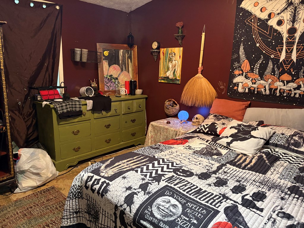 24 Doe Run Suches, GA 30572 - Photo 14 of 46 a bedroom with a bed and window