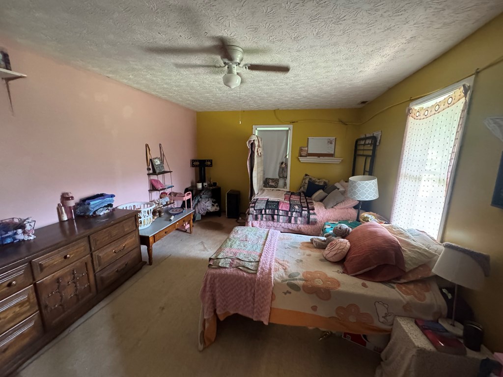 24 Doe Run Suches, GA 30572 - Photo 25 of 46 a bed room with furniture and a window