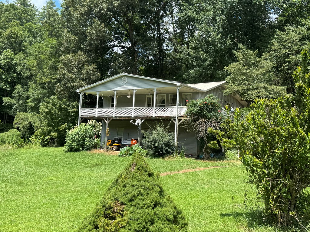 24 Doe Run Suches, GA 30572 - Photo 46 of 46 a front view of a house with a yard and trees