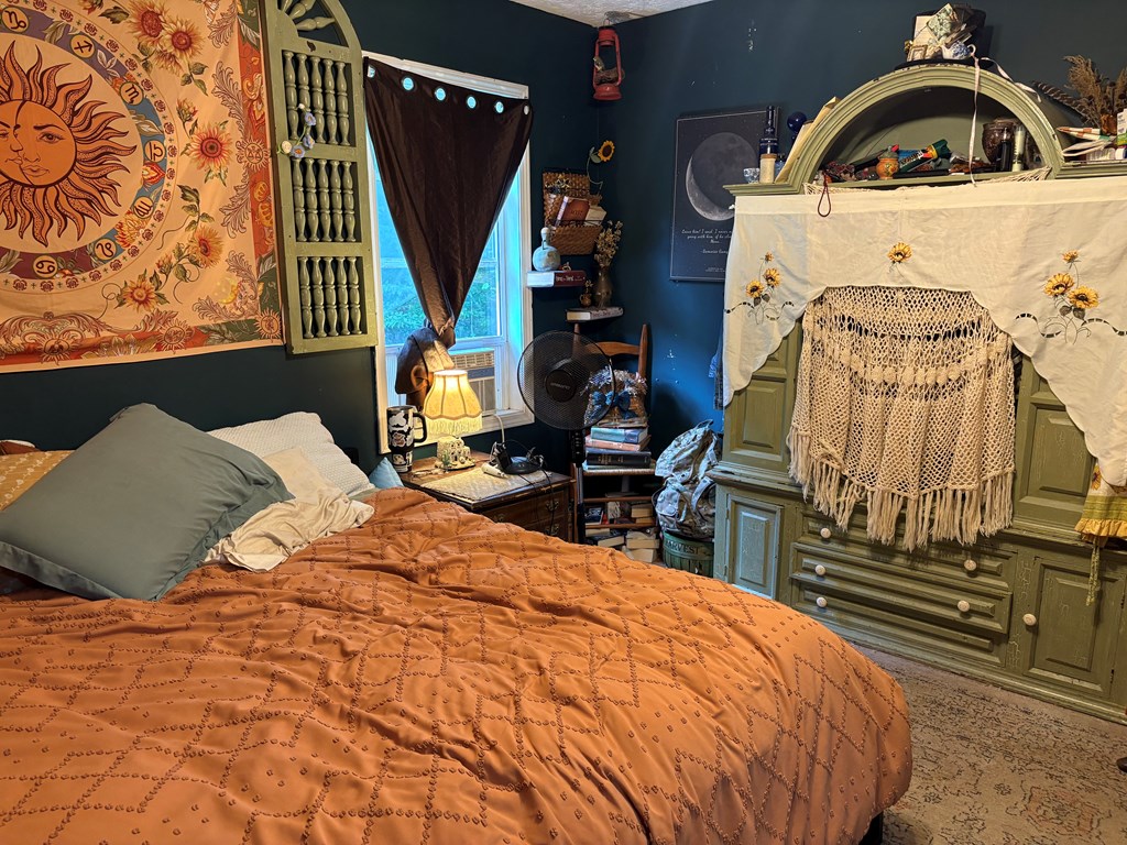 24 Doe Run Suches, GA 30572 - Photo 5 of 46 a bed sitting in a bedroom next to a window