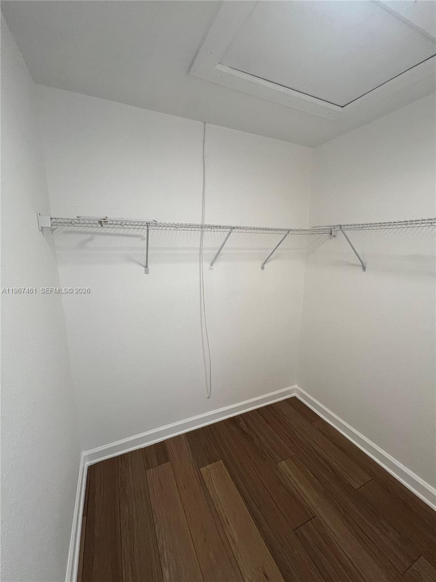 12254 Southwest 217th Street Miami, FL 33170 - Photo 18 of 29 a view of a room with wooden floor