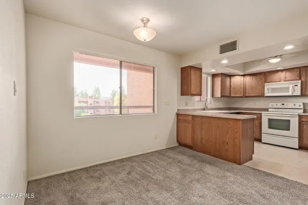 $219,000 | 12222 North Paradise Village Parkway West, Unit 429, Phoenix, AZ 85032