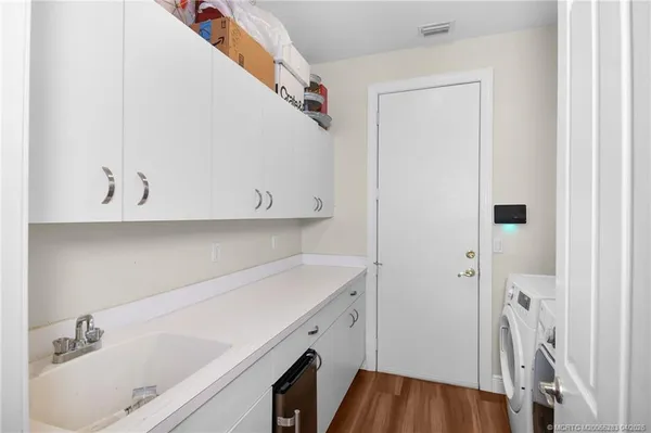 $950,000 | 4441 Southwest Long Bay Drive, Palm City, FL 34990