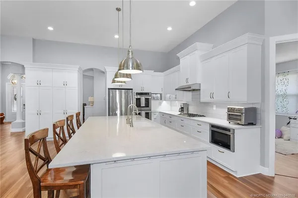 $950,000 | 4441 Southwest Long Bay Drive, Palm City, FL 34990