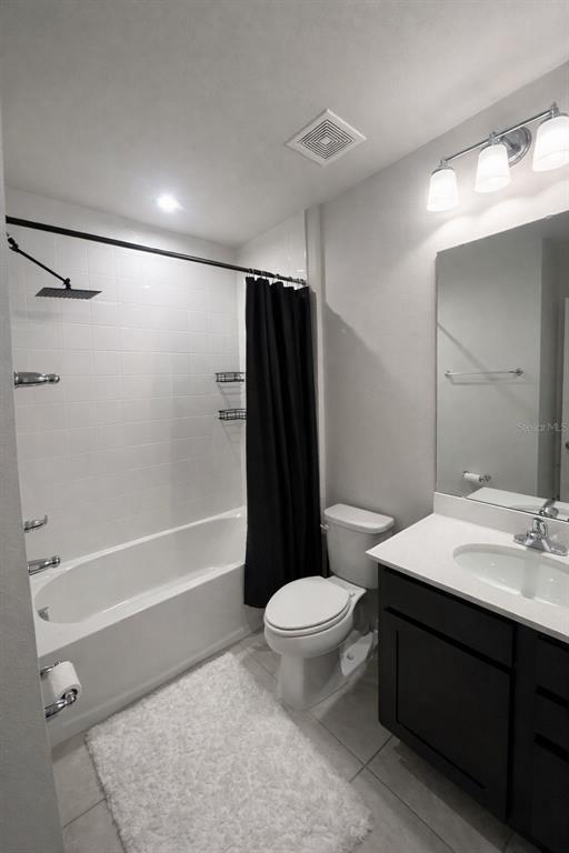 3109 Victoria Inlet Drive Holiday, FL 34691 - Photo 23 of 23 a bathroom with a sink a toilet and shower