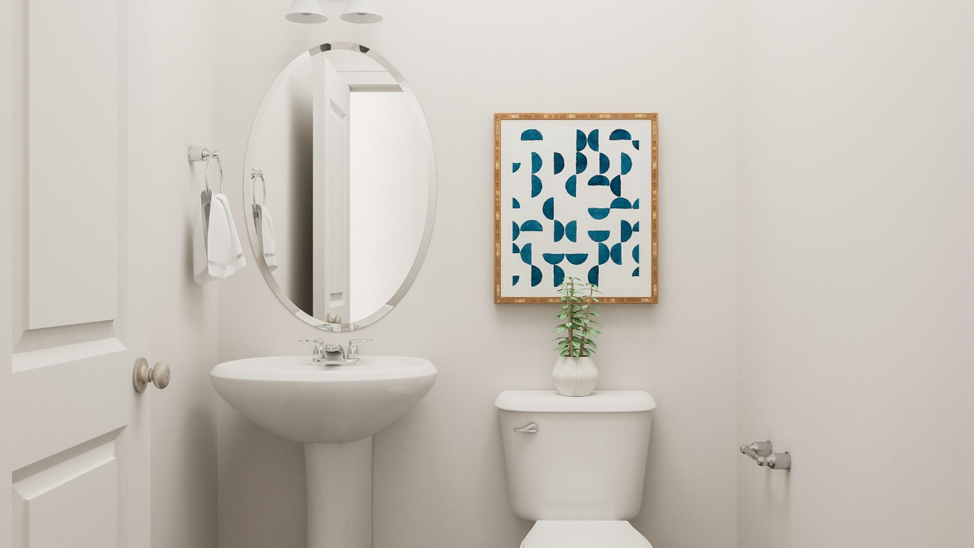 6209 Truxton Lane, Unit 1321 Raleigh, NC 27616 - Photo 21 of 23 a bathroom with a toilet sink and mirror
