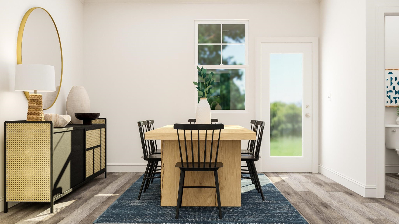 6209 Truxton Lane, Unit 1321 Raleigh, NC 27616 - Photo 9 of 23 a view of a dining room with furniture window and wooden floor