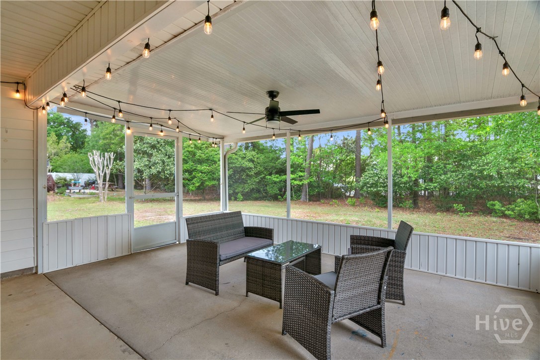 86 Yellow Jasmine Court Pooler, GA 31322 - Photo 18 of 23 Screened Back Porch