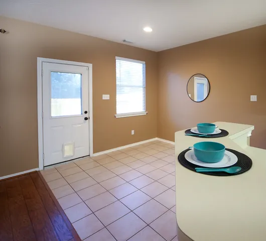 a bedroom with a bed and dresser