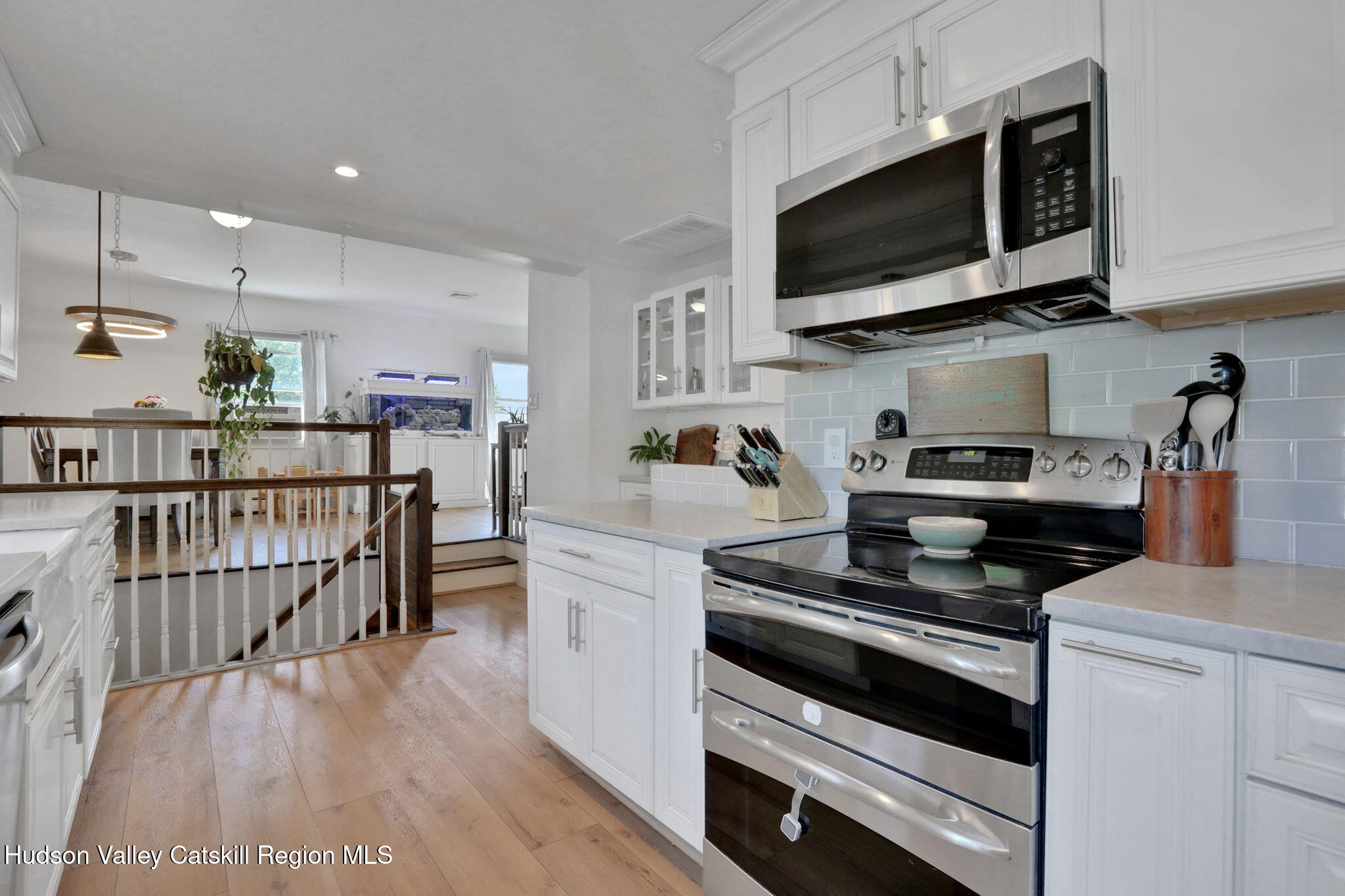 2294 Highway 32 Saugerties, NY 12477 - Photo 15 of 36 a kitchen with a stove and a microwave