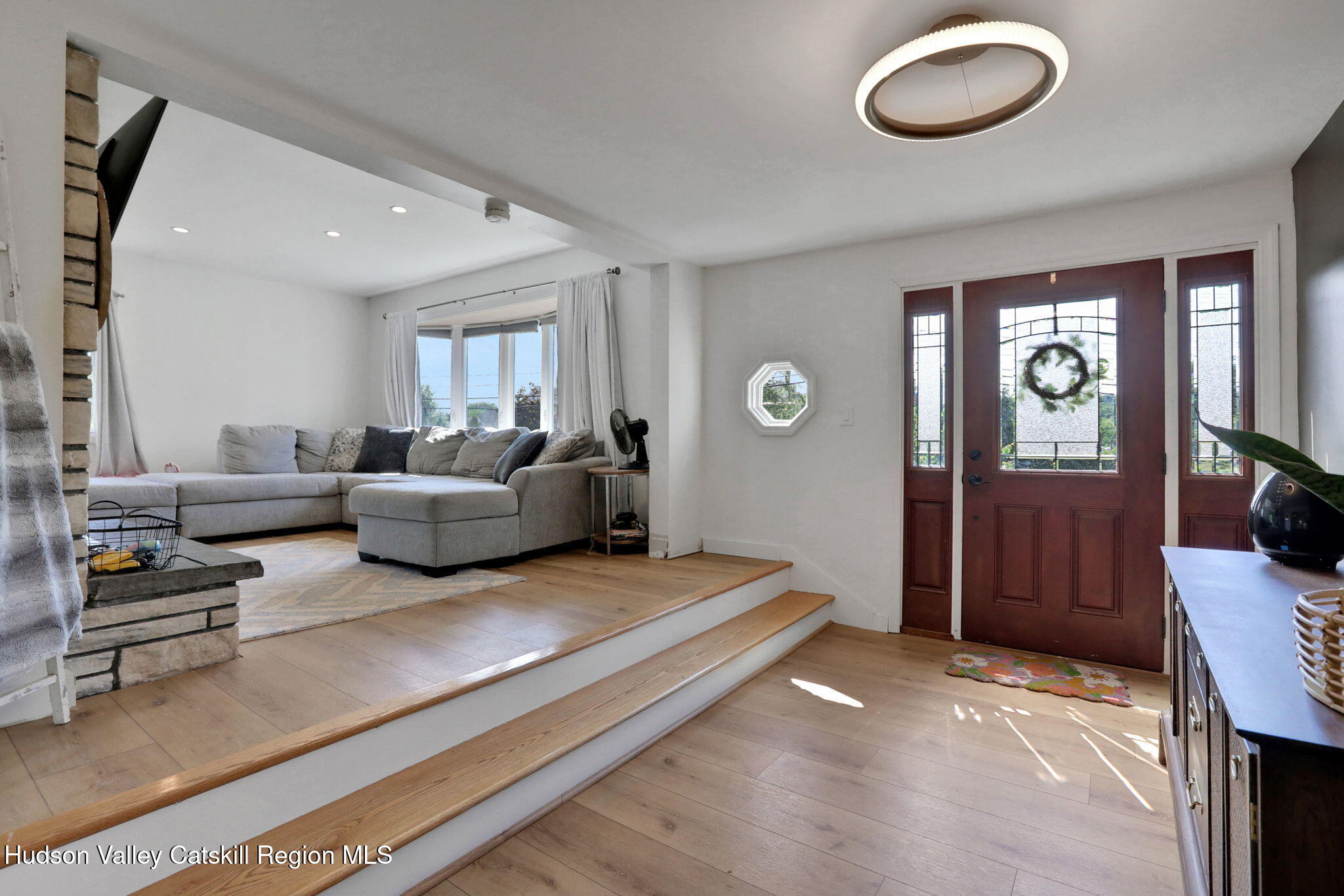 2294 Highway 32 Saugerties, NY 12477 - Photo 2 of 36 a living room with furniture and a flat screen tv