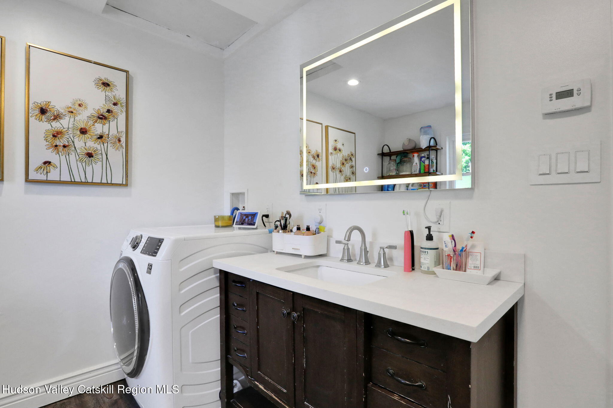 2294 Highway 32 Saugerties, NY 12477 - Photo 23 of 36 a bathroom with a sink vanity and a mirror