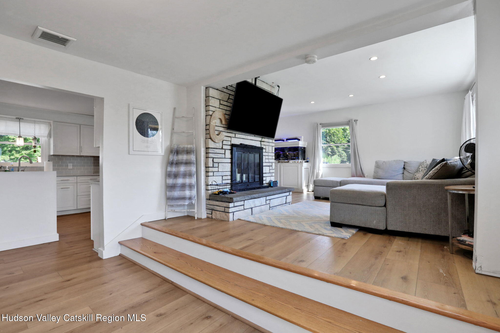 2294 Highway 32 Saugerties, NY 12477 - Photo 3 of 36 a living room with furniture and a flat screen tv