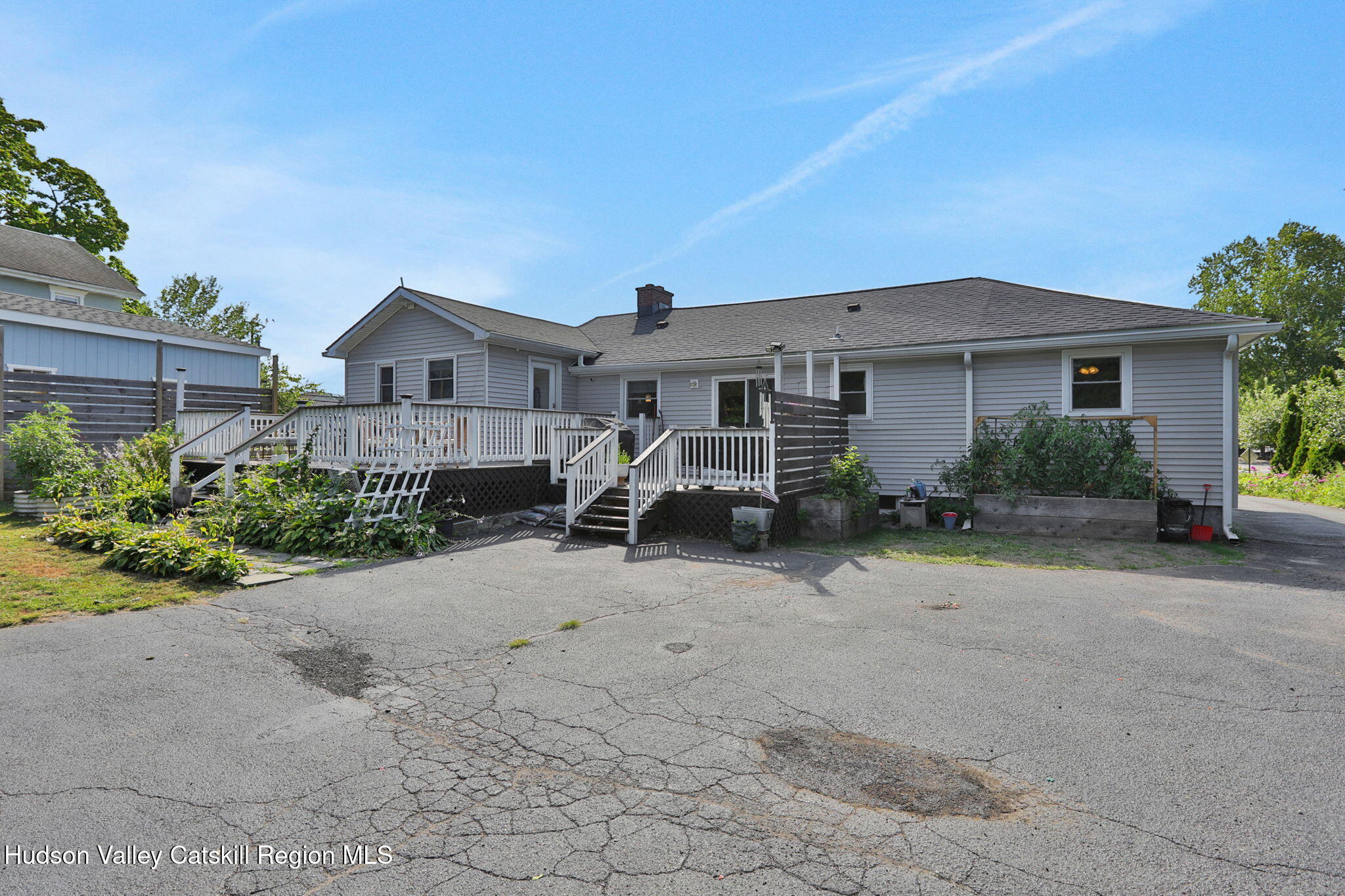 2294 Highway 32 Saugerties, NY 12477 - Photo 31 of 36 a front view of a house with garden