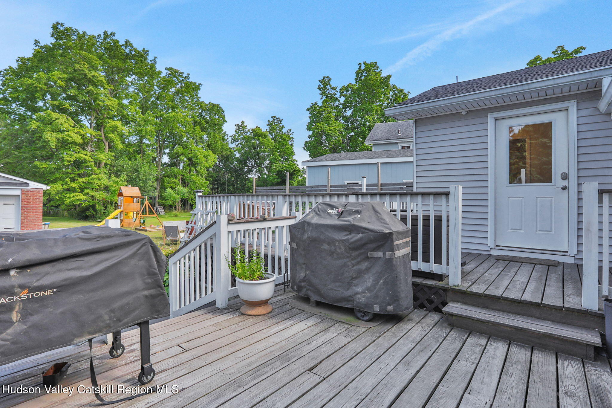 2294 Highway 32 Saugerties, NY 12477 - Photo 33 of 36 a view of a deck with wooden floor and seating space