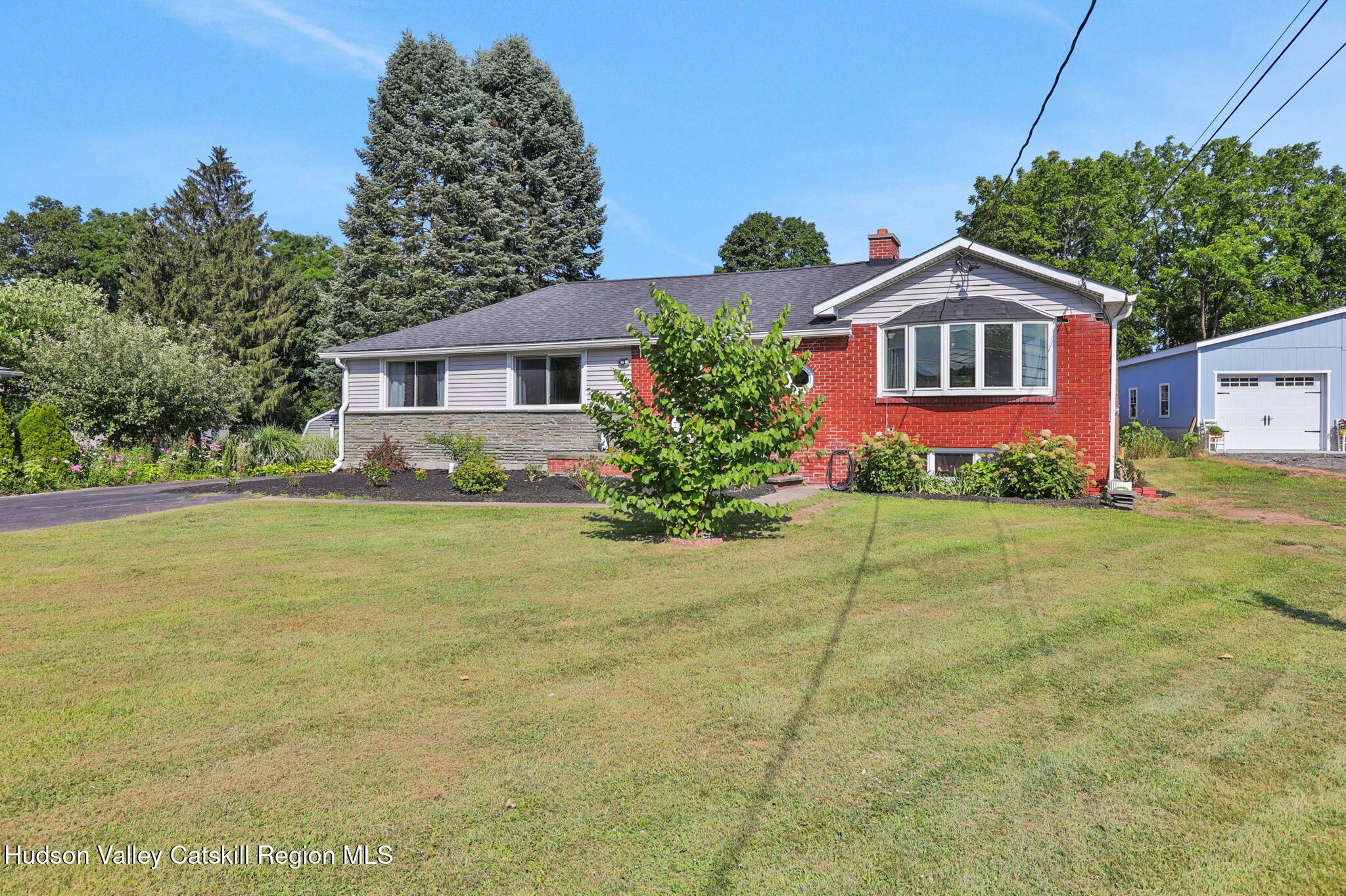 2294 Highway 32 Saugerties, NY 12477 - Photo 34 of 36 a front view of a house with garden