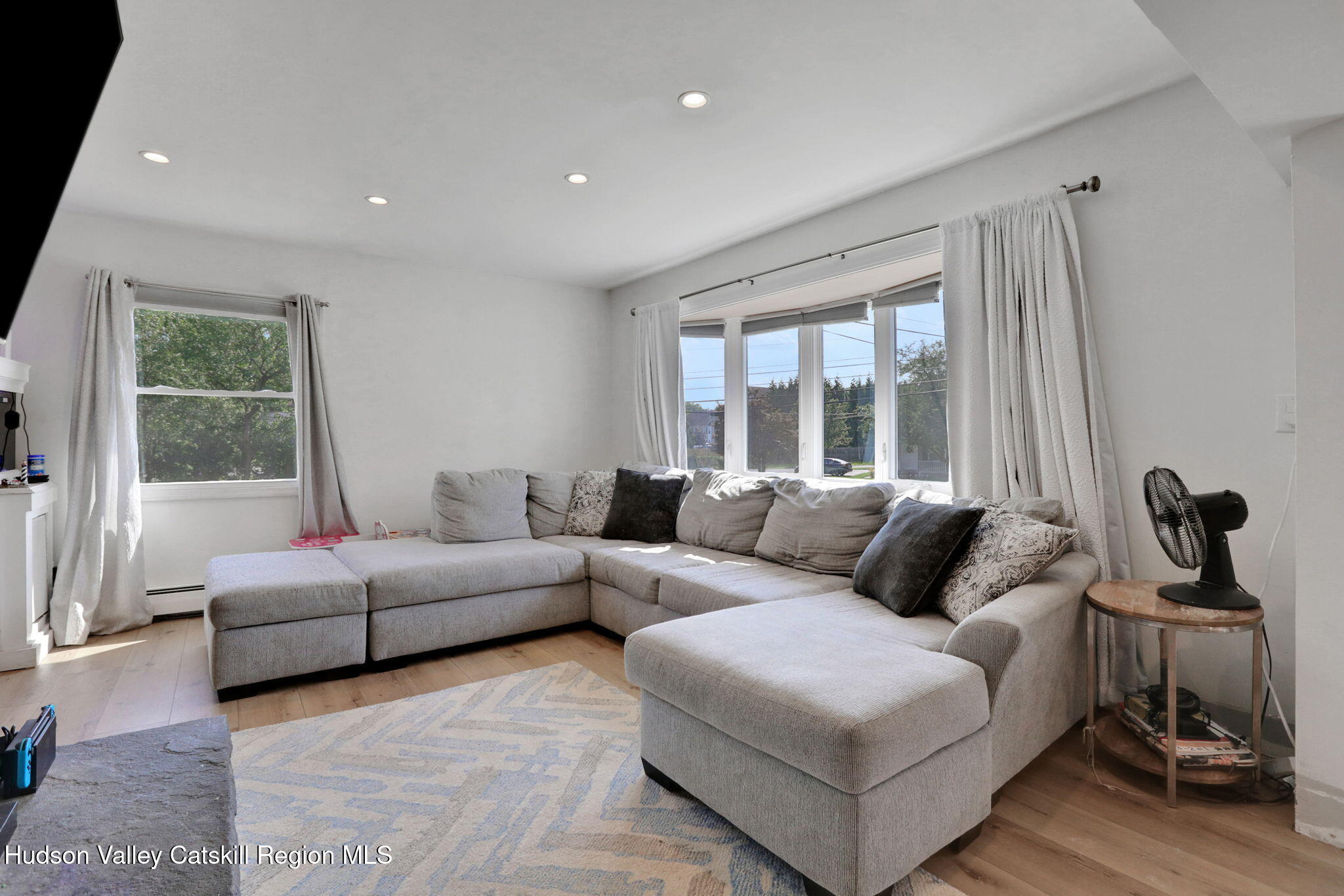 2294 Highway 32 Saugerties, NY 12477 - Photo 5 of 36 a living room with furniture and a large window