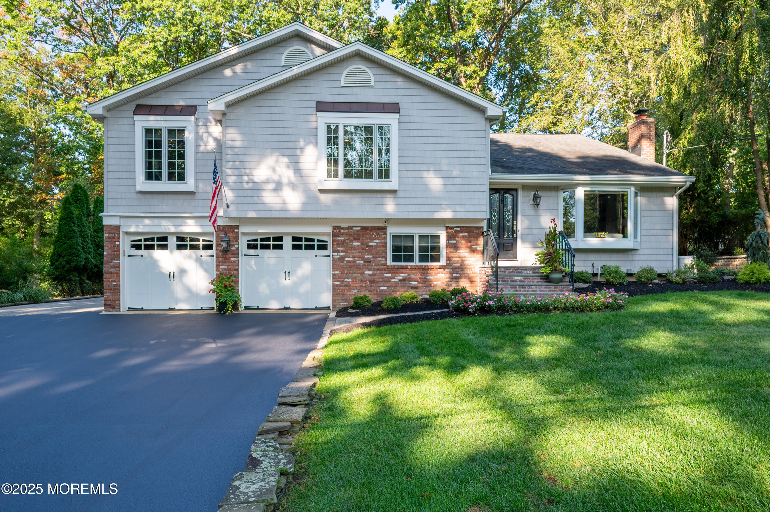 24 Princeton Street Red Bank, NJ 07701 - Photo 1 of 37 a front view of a house with a yard