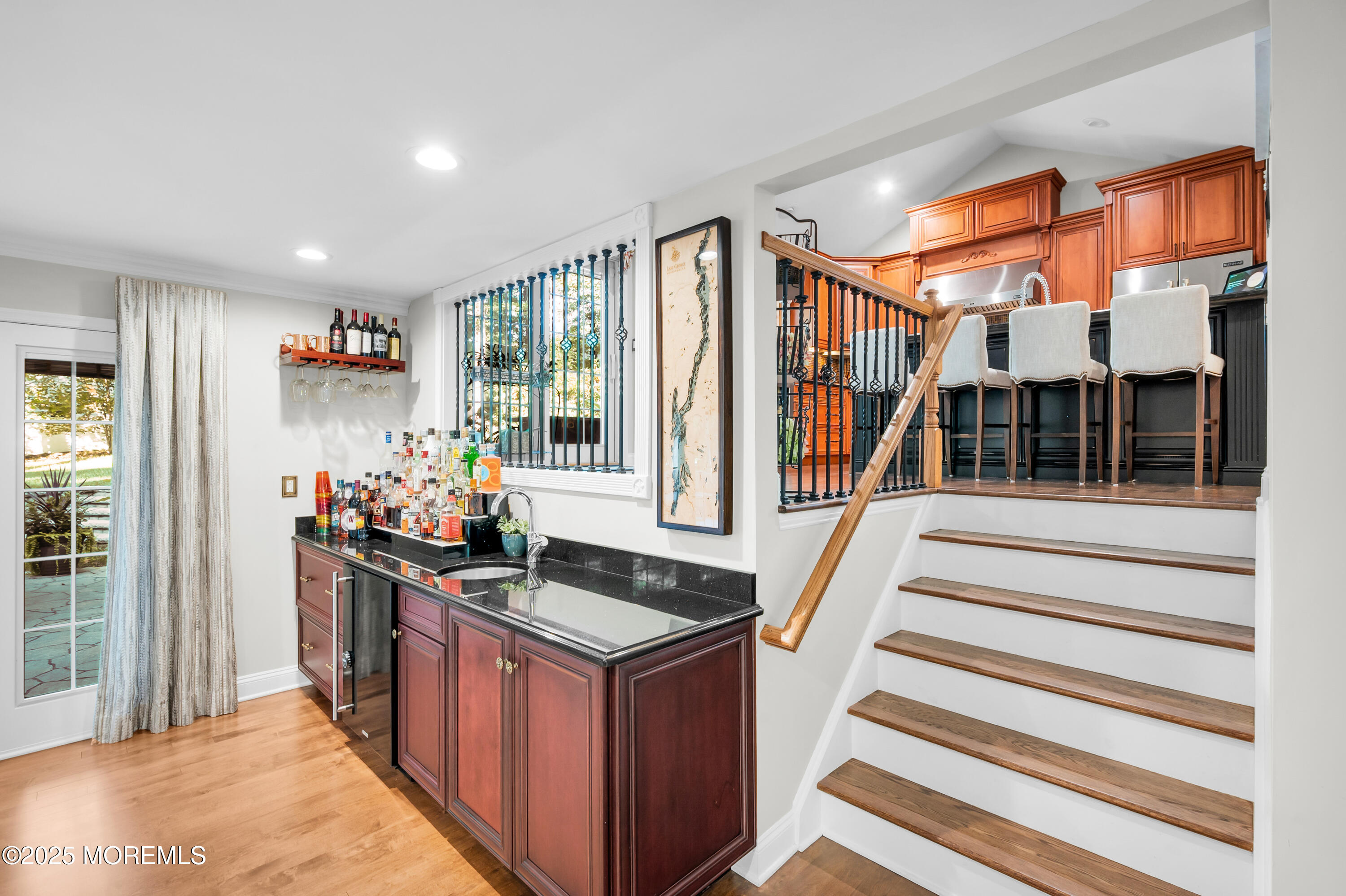 24 Princeton Street Red Bank, NJ 07701 - Photo 11 of 37 a kitchen that has a lot of cabinets in it