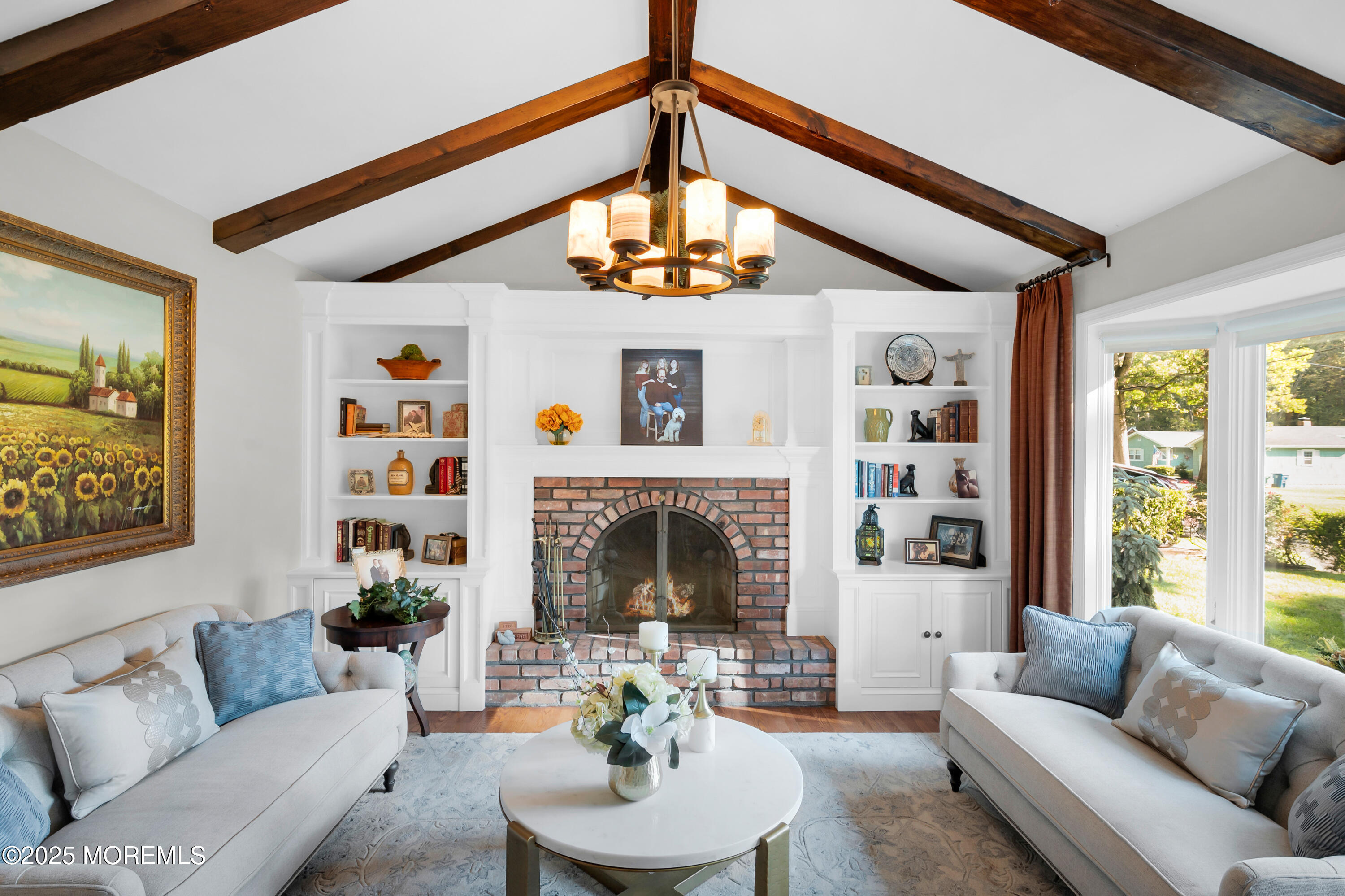 24 Princeton Street Red Bank, NJ 07701 - Photo 13 of 37 a living room with furniture and a fireplace