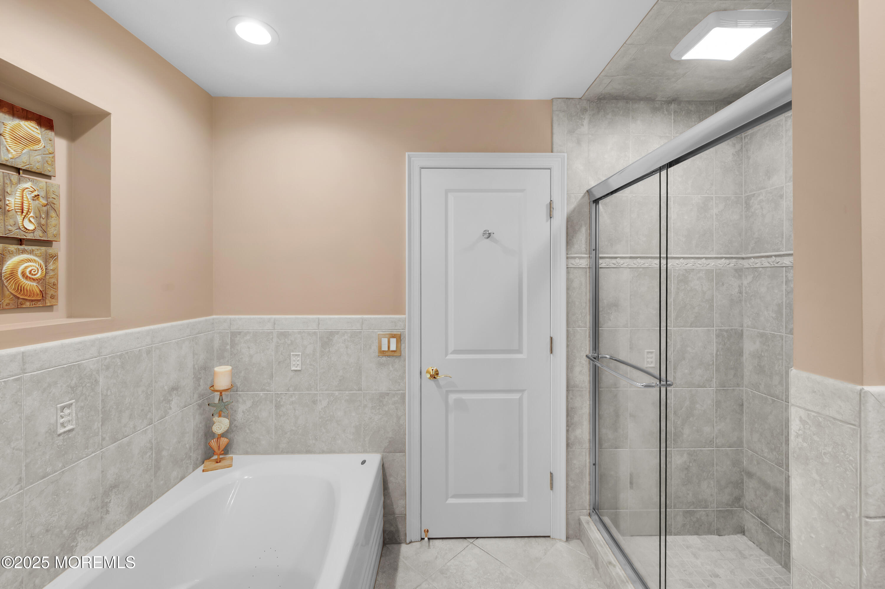 24 Princeton Street Red Bank, NJ 07701 - Photo 19 of 37 a bathroom with a bathtub and a shower