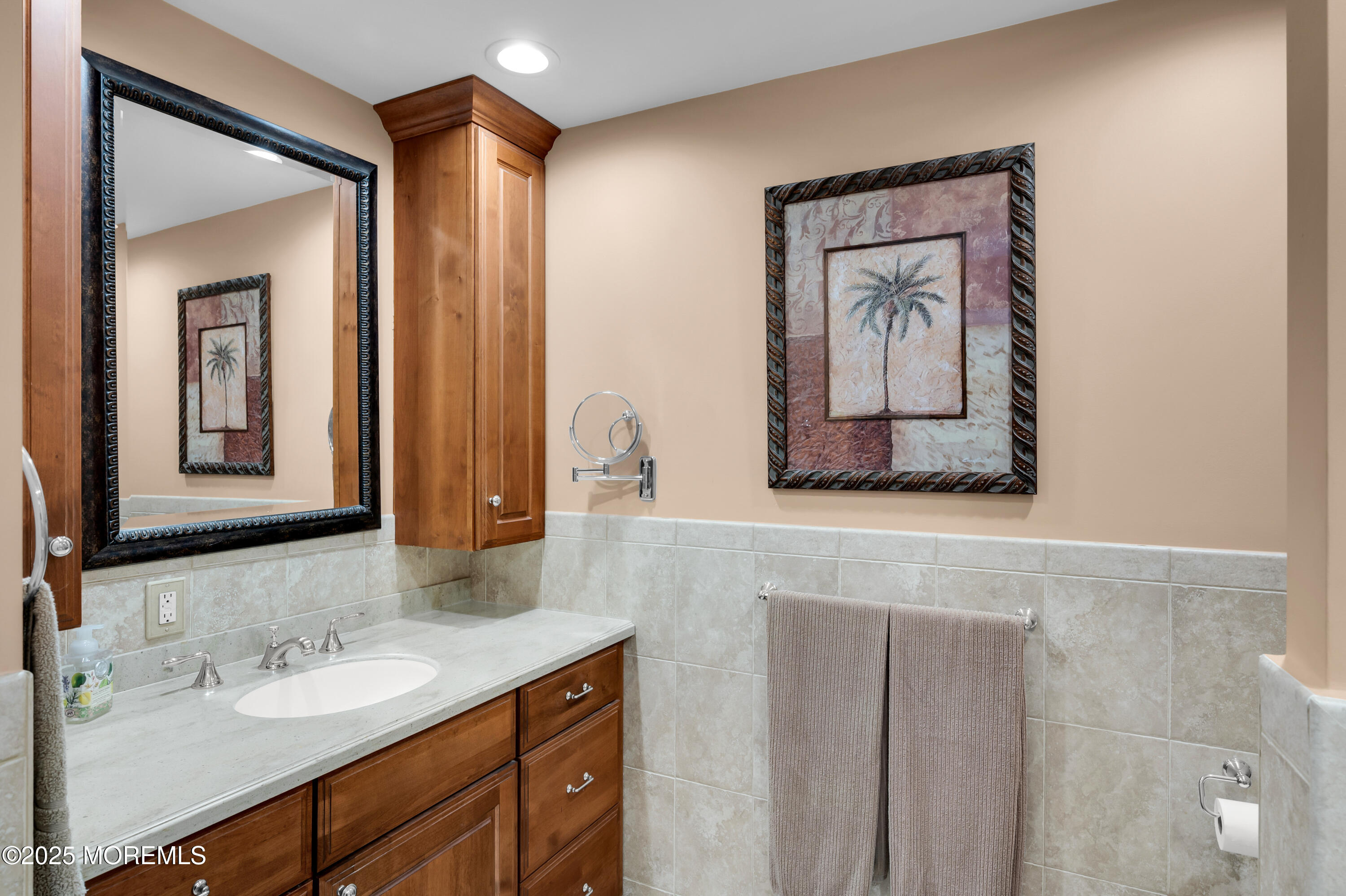 24 Princeton Street Red Bank, NJ 07701 - Photo 20 of 37 a bathroom with a sink and a mirror