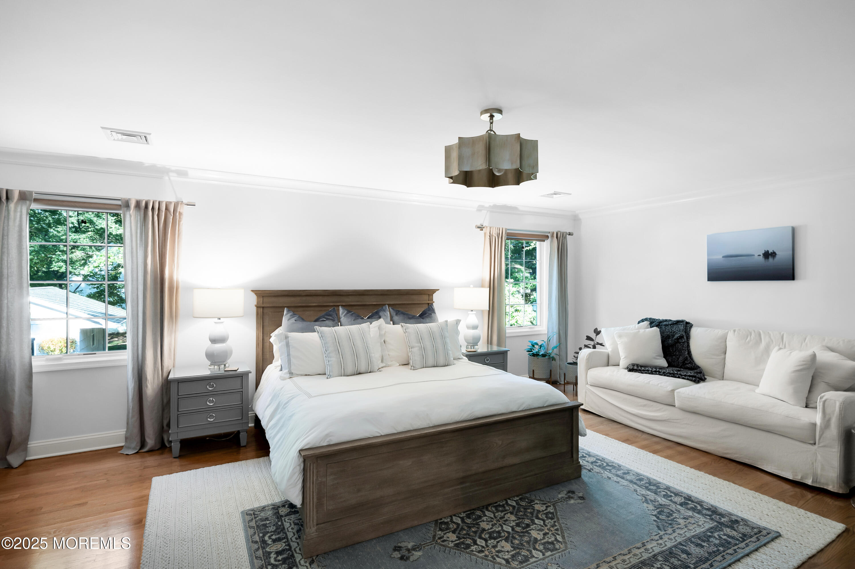 24 Princeton Street Red Bank, NJ 07701 - Photo 21 of 37 a bedroom with a large bed and a couch