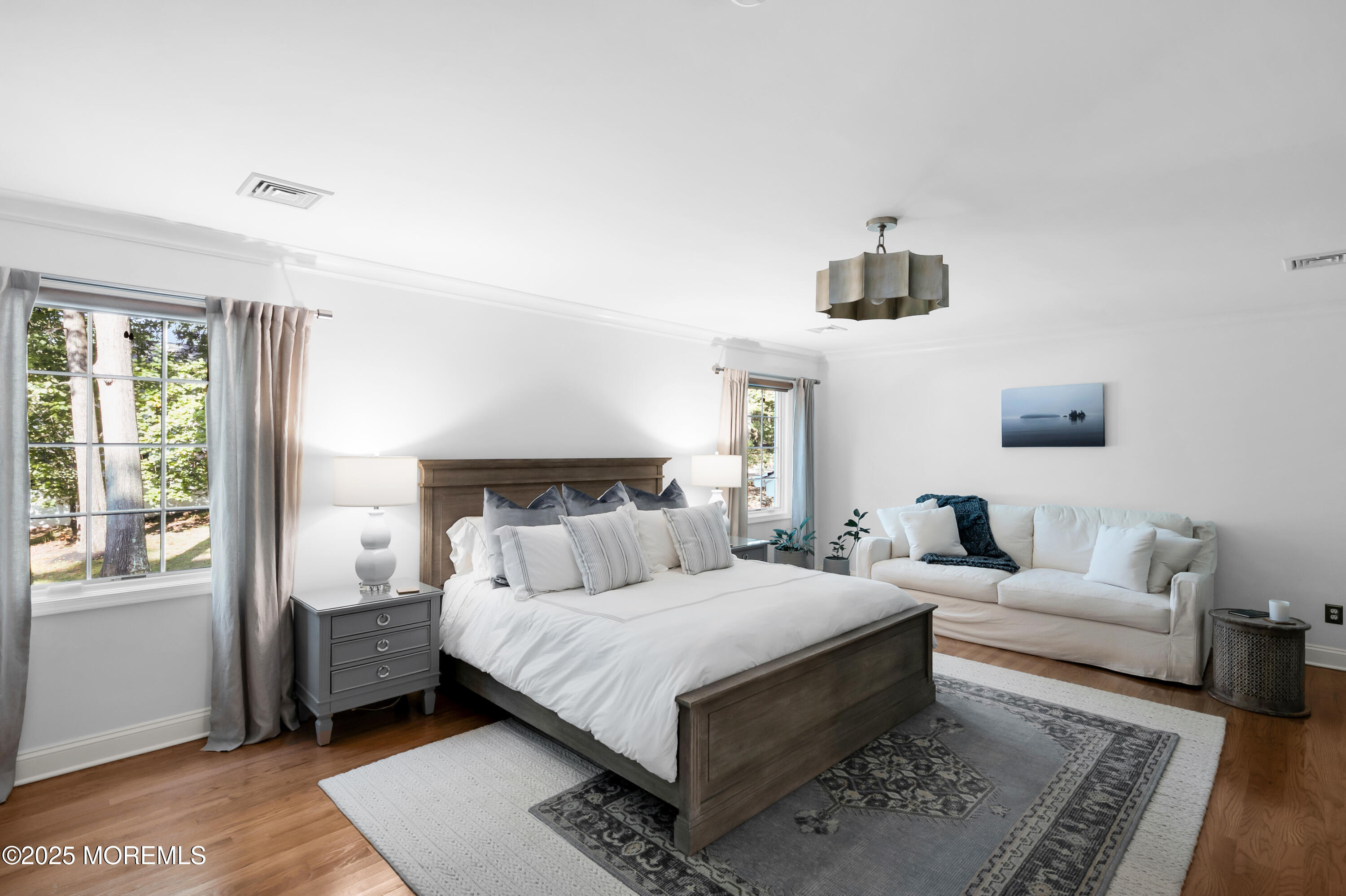 24 Princeton Street Red Bank, NJ 07701 - Photo 22 of 37 a bedroom with a bed a couch and a window