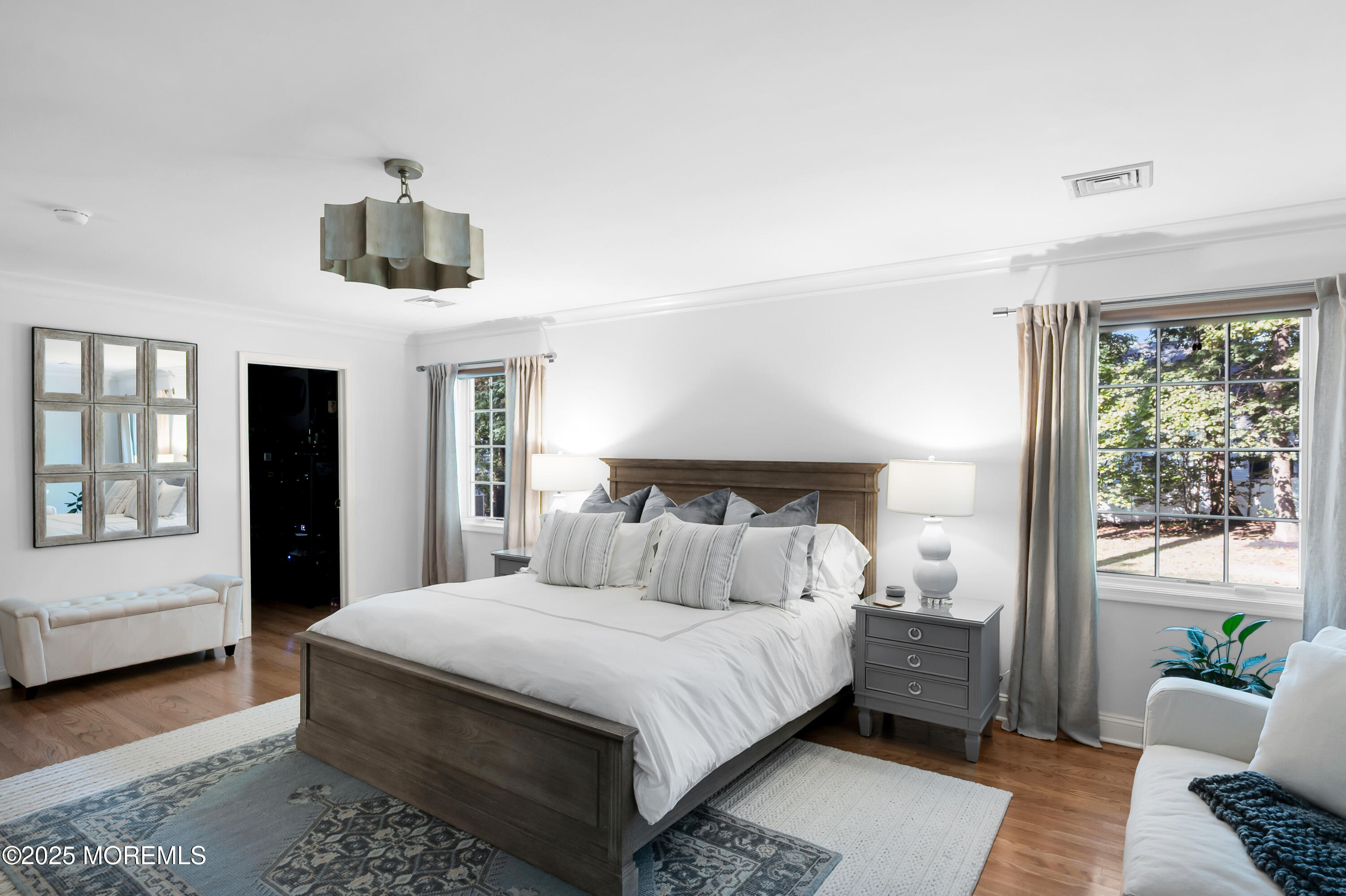 24 Princeton Street Red Bank, NJ 07701 - Photo 24 of 37 a bedroom with a large bed and a window