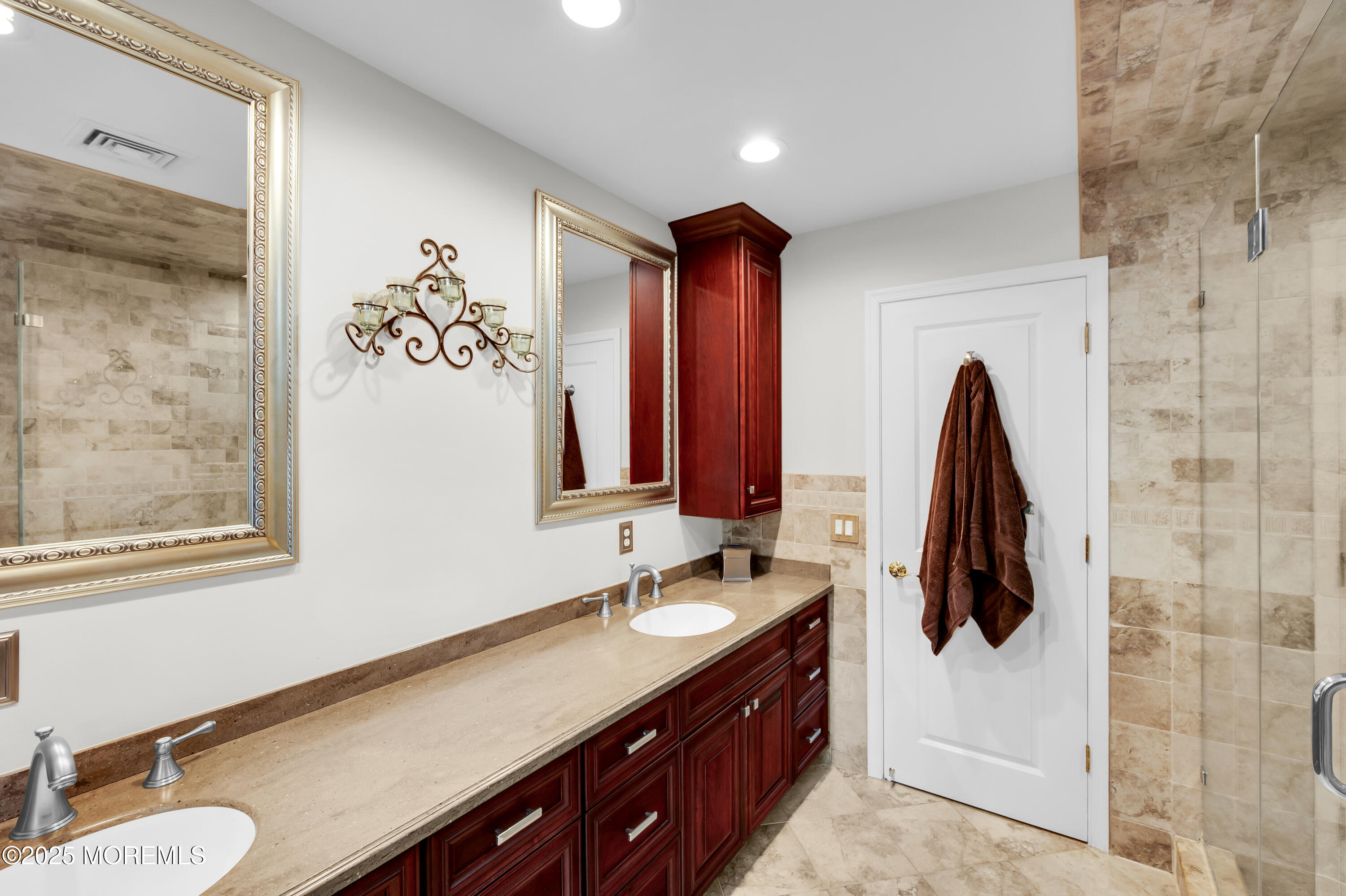 24 Princeton Street Red Bank, NJ 07701 - Photo 25 of 37 a bathroom with a sink double vanity and shower