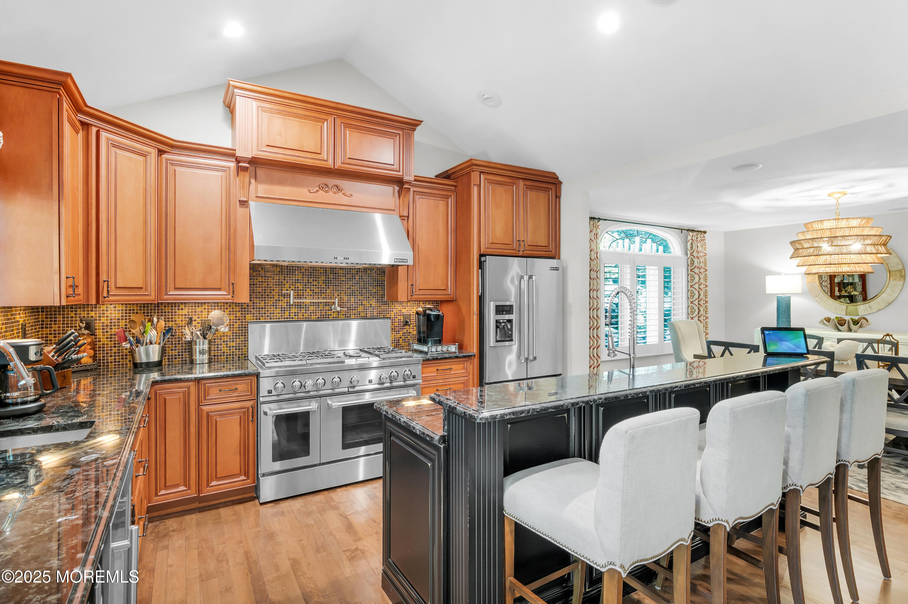 24 Princeton Street Red Bank, NJ 07701 - Photo 3 of 37 a kitchen with stainless steel appliances granite countertop a stove top oven a sink dishwasher and cabinets with wooden floor
