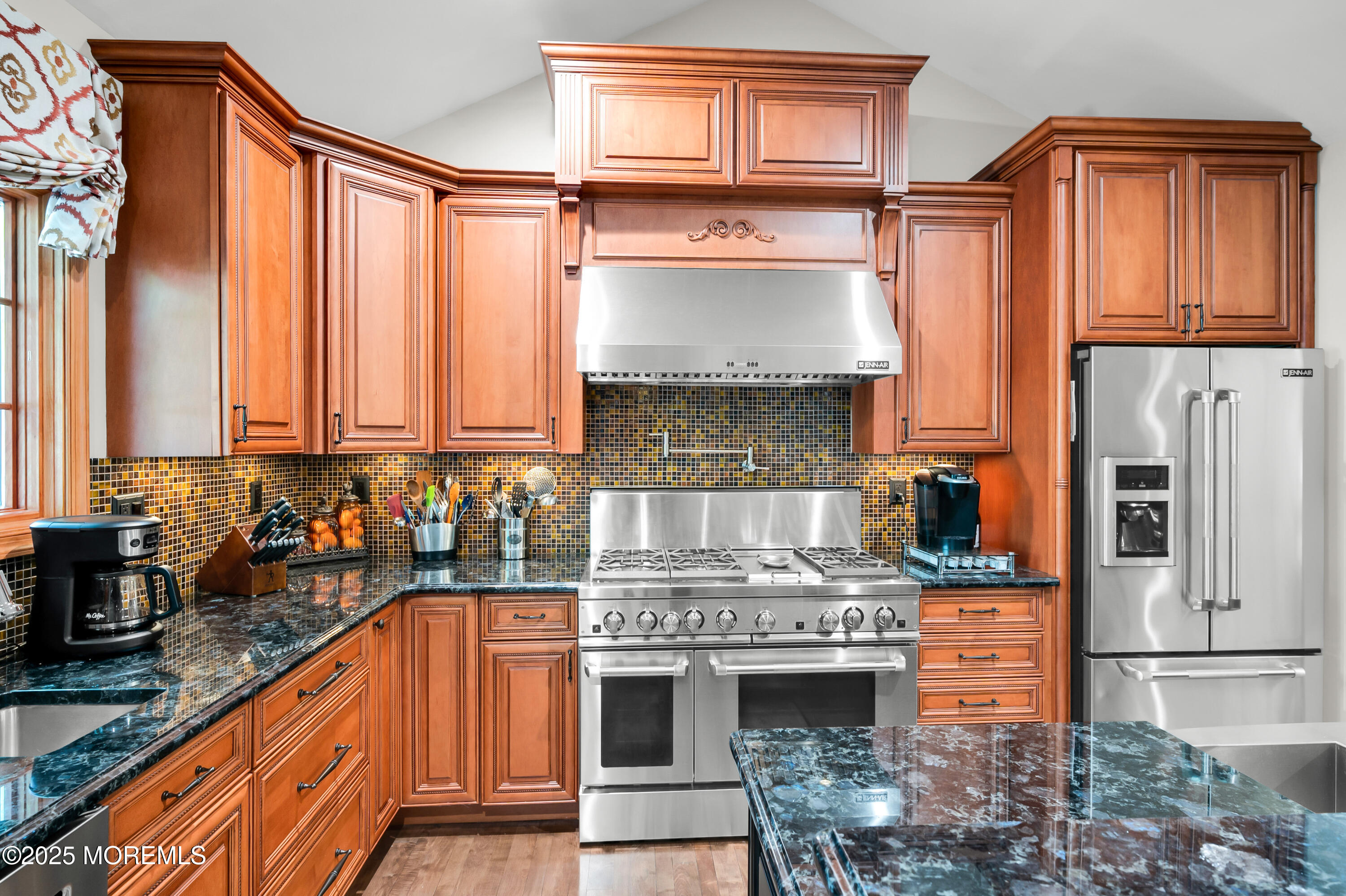 24 Princeton Street Red Bank, NJ 07701 - Photo 4 of 37 a kitchen with stainless steel appliances granite countertop a stove a sink and a refrigerator