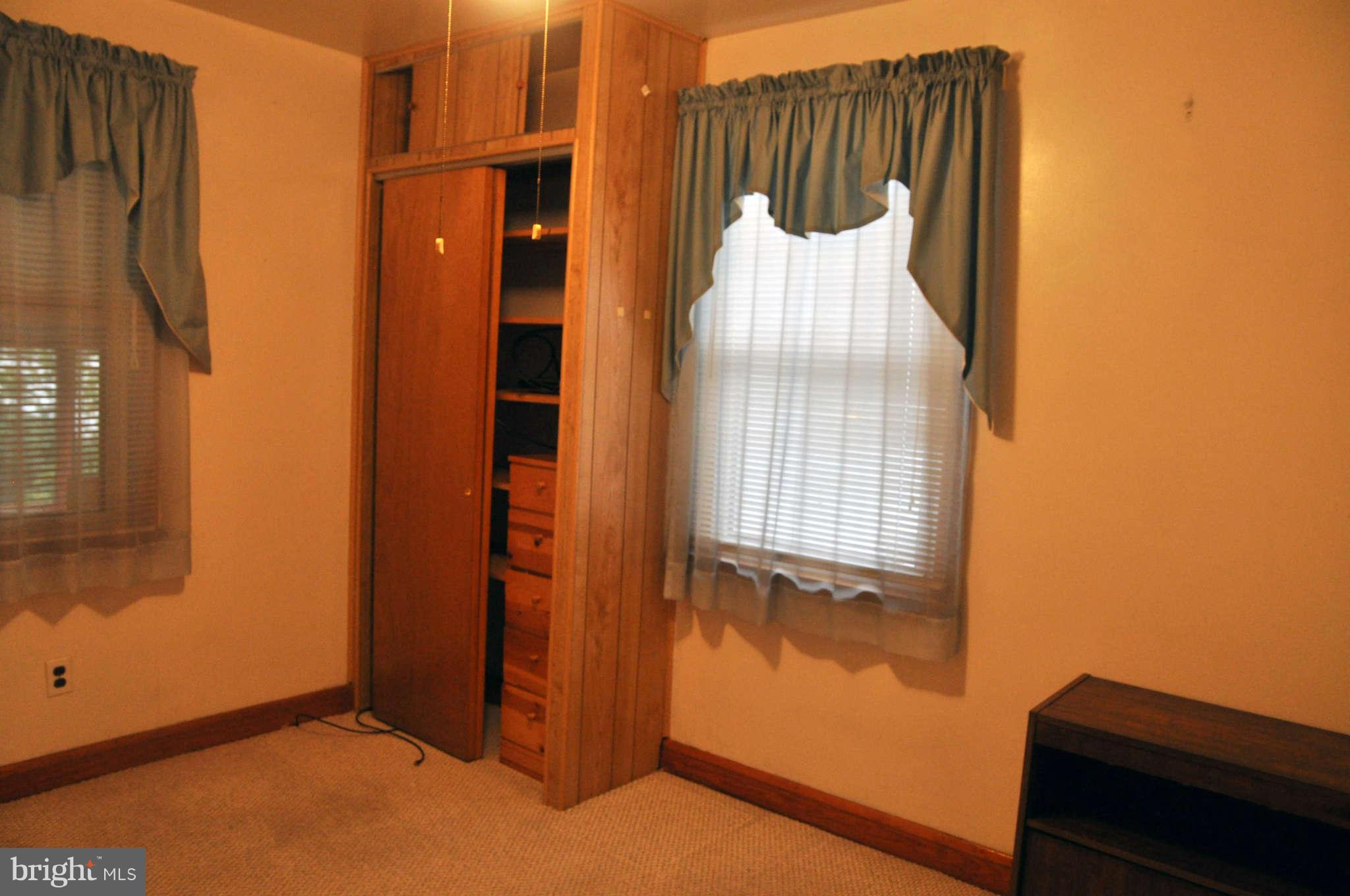 1807 Middleborough Road Baltimore, MD 21221 - Photo 8 of 12 a view of walk in closet with clothes