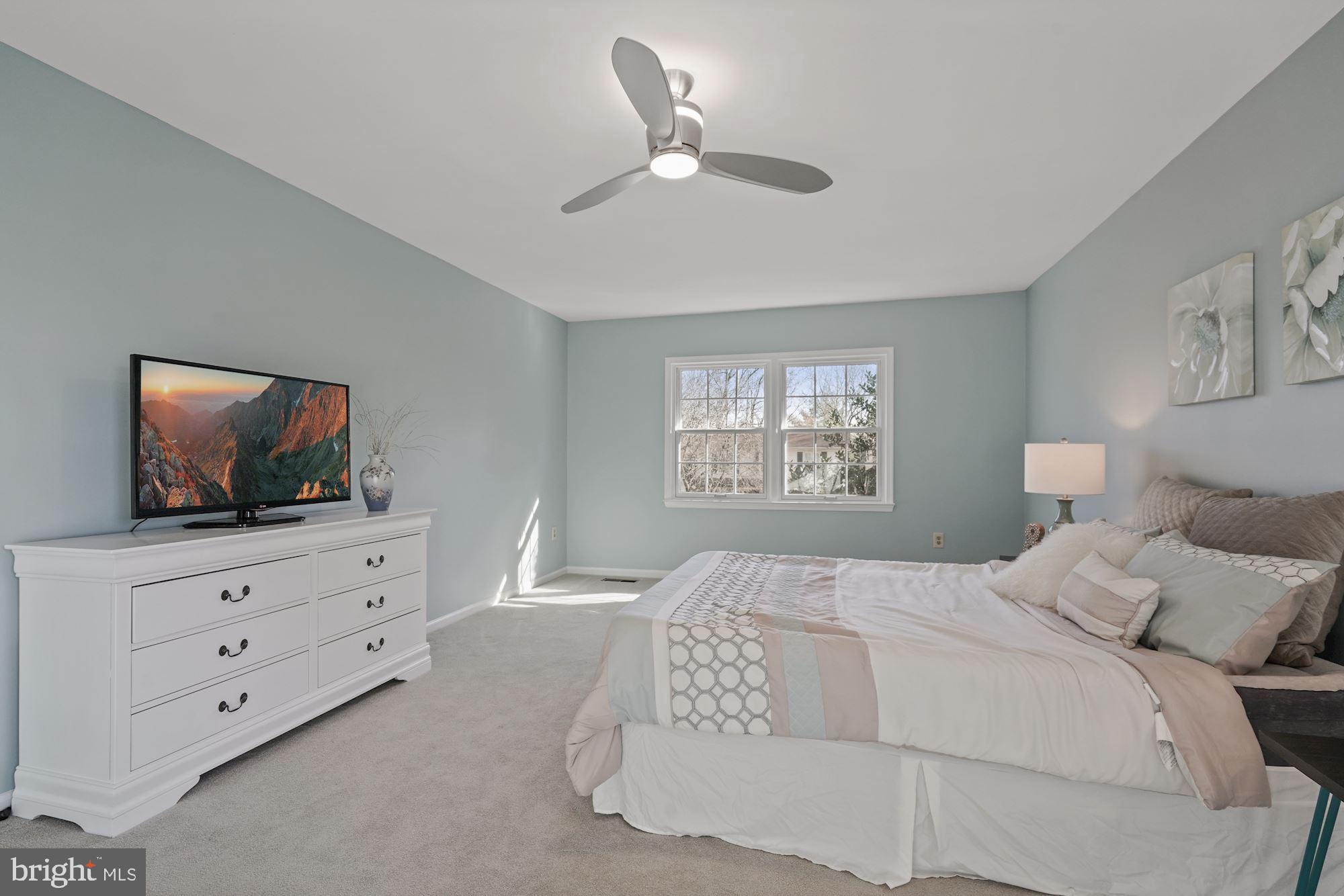 7132 Sontag Way Springfield, VA 22153 - Photo 27 of 53 master bedroom w/ new lighted ceiling fan