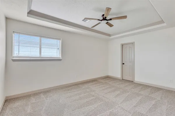 a view of room with ceiling fan