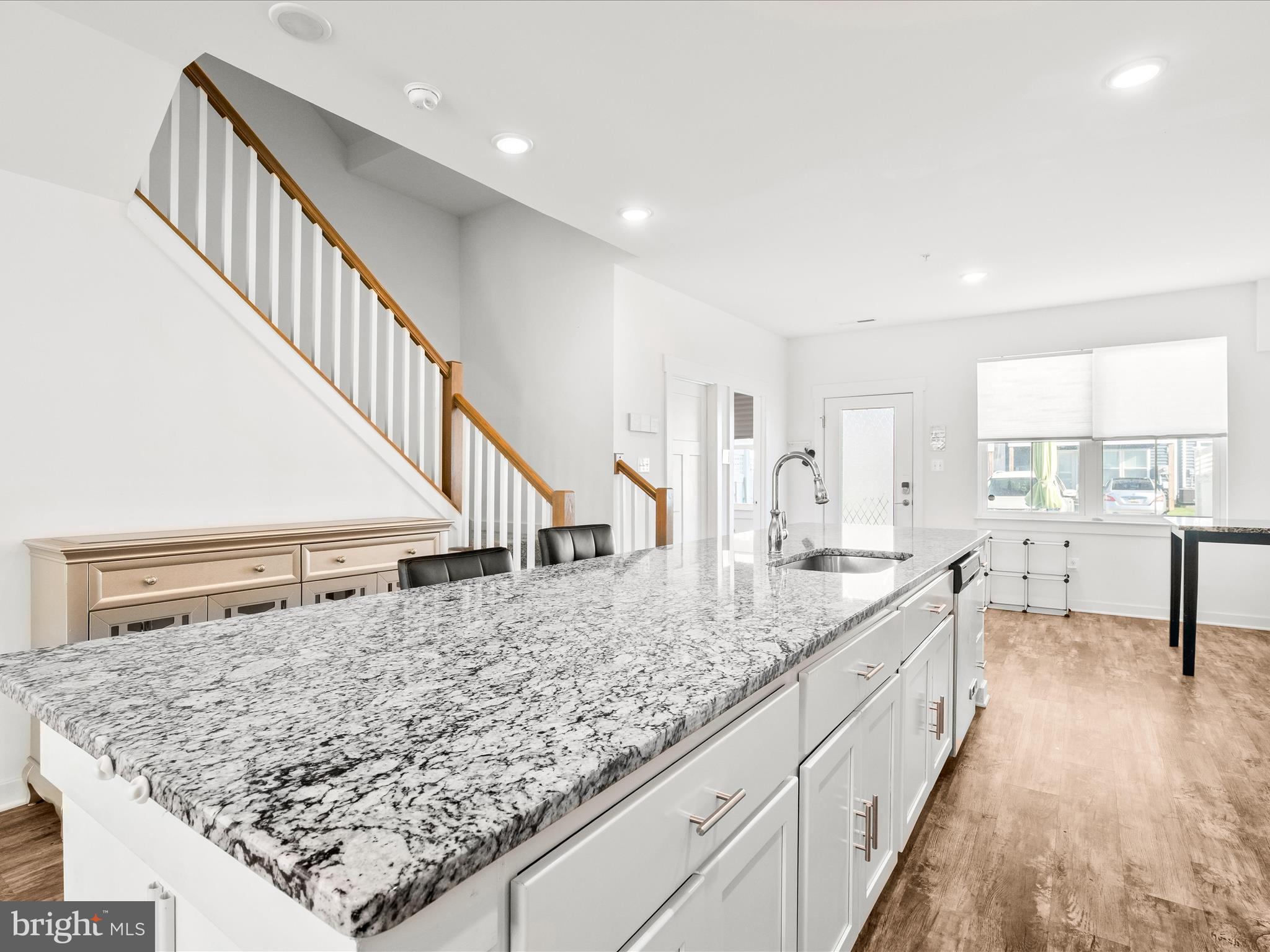 404 Waverley Drive Frederick, MD 21702 - Photo 11 of 28 a living room with granite countertop living room and hallway